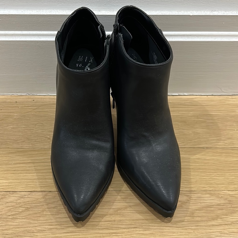 Never worn black faux leather stiletto booties
